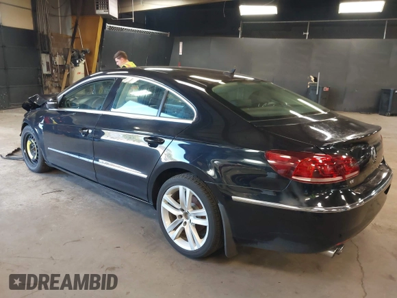 2015 Volkswagen CC R-Line with VIN WVWBP7AN8FE828106, listed as a IAAI auction lot 41867821 with 67,067 mi miles and . Bid and sale history available at DreamBid. Image 3.
