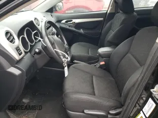 2009 Pontiac Vibe with VIN 5Y2SM67009Z429301, listed as a Copart auction lot 80753404 with 245,490 mi miles and Salvage Title. Bid and sale history available at carsss.com. Image 7.