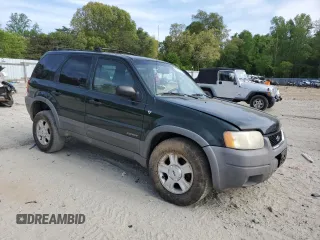 2001 Ford Escape XLT with VIN 1FMCU04181KF62444, listed as a Copart auction lot 55272615 with 265,129 mi miles and Salvage title. Bid and sale history available at DreamBid. Image 4.