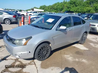 2010 Ford Focus SES with VIN 1FAHP3GN5AW115229, listed as a IAAI auction lot 42098503 with 156,127 mi miles. Bid and sale history available at carsss.com. Image 2.