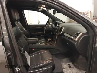 2016 Jeep Grand Cherokee Limited 75th Anniversary with VIN 1C4RJFBG2GC349154, listed as a IAAI auction lot 41392239 with 135,627 mi miles and . Bid and sale history available at DreamBid. Image 5.