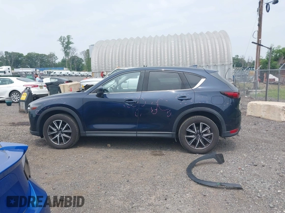 2018 Mazda CX-5 Grand Touring with VIN JM3KFBDMXJ0361812, listed as a IAAI auction lot 42509752 with 131,386 mi miles and . Bid and sale history available at DreamBid. Image 15.