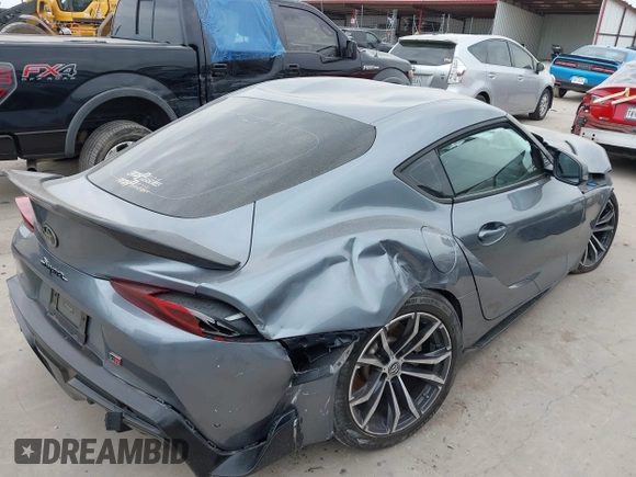 2021 Toyota Supra 2.0 with VIN WZ1DB2C0XMW038679, listed as a IAAI auction lot 42407988 with 76,316 mi miles and . Bid and sale history available at DreamBid. Image 4.