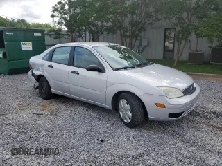 2005 Ford Focus S with VIN 1FAFP34N55W115653, listed as a Copart auction lot 63043315 with 110,593 mi miles and Salvage title. Bid and sale history available at DreamBid. Image 4.