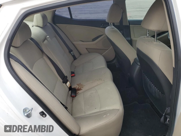 2013 Kia Optima LX z VIN KNAGM4A79D5327301, wystawiony jako Copart lot #55595565 z przebiegiem 100 366 mil mil oraz Szkoda całkowita • Salvage title. Historia ofert i sprzedaży dostępna na DreamBid. Obrazek 10.
