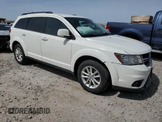 2016 Dodge Journey SXT with VIN 3C4PDCBG8GT198645, listed as a Copart auction lot 52147075 with 137,648 mi miles and Salvage Title. Bid and sale history available at carsss.com. Image 4.