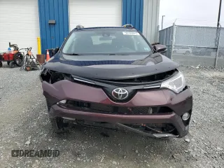 2018 Toyota RAV4 XLE with VIN 2T3RFREV2JW841670, listed as a Copart auction lot 50700675 with Not Provided miles and Salvage Title. Bid and sale history available at DreamBid. Image 5.