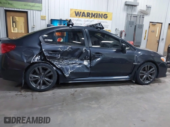 2016 Subaru WRX Premium with VIN JF1VA1E69G8801517, listed as a IAAI auction lot 41558194 with 118,332 mi miles. Bid and sale history available at carsss.com. Image 13.