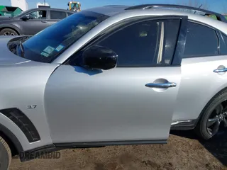 2015 Infiniti QX70 with VIN JN8CS1MW6FM482894, listed as a IAAI auction lot 41671236 with 106,599 mi miles and . Bid and sale history available at DreamBid. Image 6.