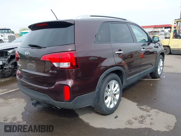 2015 Kia Sorento EX with VIN 5XYKU4A72FG628631, listed as a IAAI auction lot 41802719 with 69,888 mi miles. Bid and sale history available at carsss.com. Image 4.