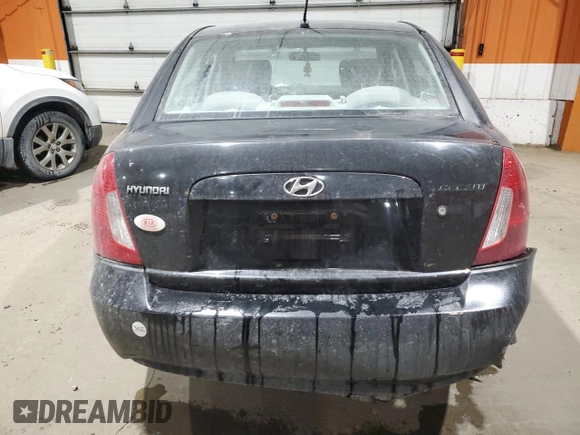 2007 Hyundai Accent GL z VIN KMHCN45C87U142295, wystawiony jako Copart lot #86149894 z przebiegiem 325 738 mil mil oraz Szkoda całkowita • Salvage title. Historia ofert i sprzedaży dostępna na DreamBid. Obrazek 6.