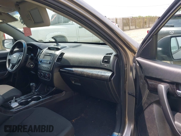 2014 Kia Sorento LX with VIN 5XYKTCA65EG467436, listed as a IAAI auction lot 42177293 with 144,387 mi miles. Bid and sale history available at carsss.com. Image 5.