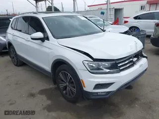 2018 Volkswagen Tiguan SEL with VIN 3VV3B7AX9JM090342, listed as a IAAI auction lot 41895823 with 98,400 mi miles. Bid and sale history available at carsss.com. Image 1.