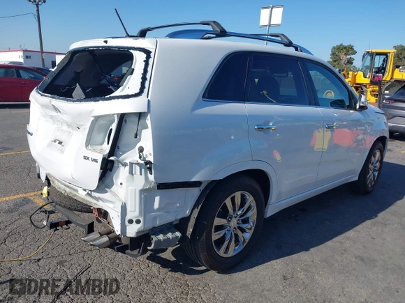 2013 Kia Sorento SX z VIN 5XYKW4A29DG325731, wystawiony jako IAAI lot #42300890 z przebiegiem 62 410 mil mil oraz . Historia ofert i sprzedaży dostępna na DreamBid. Obrazek 4.