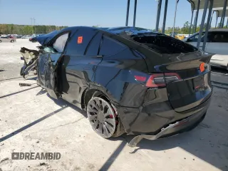 2022 Tesla Model Y Performance z VIN 7SAYGDEF2NF448013, wystawiony jako Copart lot #52323435 z przebiegiem Nie podano mil oraz Nie do naprawy. Historia ofert i sprzedaży dostępna na DreamBid. Obrazek 2.