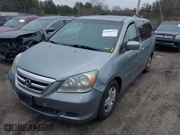 2007 Honda Odyssey EX-L with VIN 5FNRL38617B038017, listed as a IAAI auction lot 41840741 with 208,428 mi miles and . Bid and sale history available at carsss.com. Image 2.