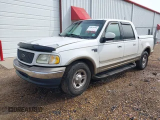 2001 Ford F-150 XLT with VIN 1FTRW07641KC51870, listed as a IAAI auction lot 41879102 with 202,967 mi miles and . Bid and sale history available at DreamBid. Image 2.