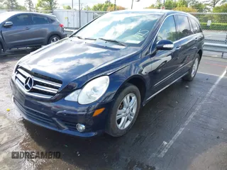 2009 Mercedes-Benz R 3.5L with VIN 4JGCB65E49A098144, listed as a IAAI auction lot 42027237 with 232,786 mi miles. Bid and sale history available at carsss.com. Image 2.