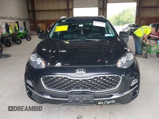 2021 Kia Sportage EX z VIN KNDPNCAC5M7886551, wystawiony jako IAAI lot #42645206 z przebiegiem 49 312 mil mil oraz . Historia ofert i sprzedaży dostępna na DreamBid. Obrazek 12.