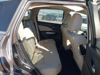 2015 Honda CR-V EX-L with VIN 2HKRM3H7XFH519437, listed as a IAAI auction lot 41656984 with 143,107 mi miles. Bid and sale history available at carsss.com. Image 8.
