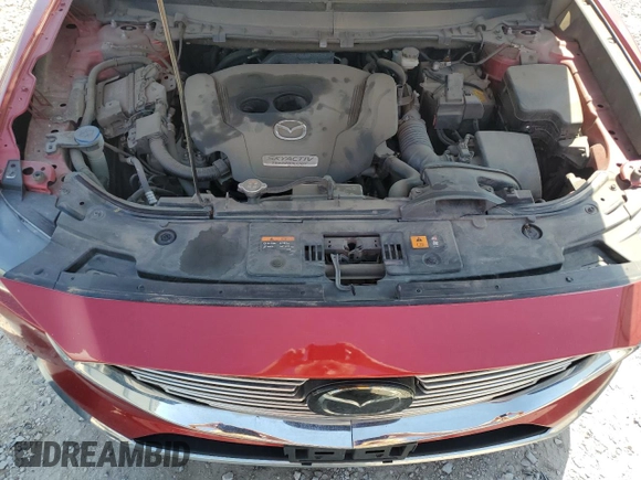2019 Mazda CX-9 Grand Touring z VIN JM3TCBDY6K0326394, wystawiony jako Copart lot #50057545 z przebiegiem 55 272 mil mil oraz Szkoda całkowita • Salvage title. Historia ofert i sprzedaży dostępna na DreamBid. Obrazek 11.