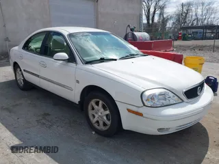 2000 Mercury Sable LS Premium z VIN 1MEFM55S6YA628641, wystawiony jako IAAI lot #41875950 z przebiegiem 35 453 mil mil oraz . Historia ofert i sprzedaży dostępna na DreamBid. Obrazek 1.