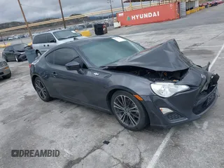 2016 Scion FR-S with VIN JF1ZNAA11G9708176, listed as a IAAI auction lot 41787608 with 82,815 mi miles. Bid and sale history available at carsss.com. Image 1.