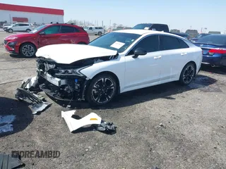 2024 Kia K5 GT-Line z VIN 5XXG64J20RG234249, wystawiony jako IAAI lot #41823685 z przebiegiem 33 168 mil mil oraz . Historia ofert i sprzedaży dostępna na DreamBid. Obrazek 2.