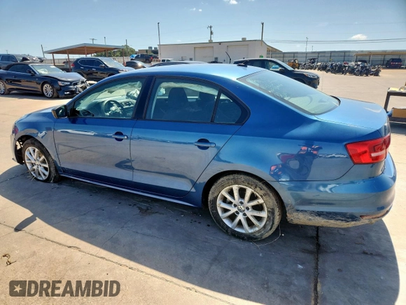 2015 Volkswagen Jetta SE with VIN 3VWD17AJ7FM272661, listed as a Copart auction lot 61285255 with 113,334 mi miles and Salvage title. Bid and sale history available at DreamBid. Image 2.