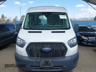 2021 Ford Transit Cargo with VIN 1FTBR1C84MKA37715, listed as a IAAI auction lot 41912160 with 185,240 mi miles. Bid and sale history available at carsss.com. Image 13.