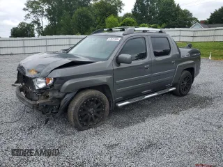 2007 Honda Ridgeline RTL with VIN 2HJYK16567H521599, listed as a Copart auction lot 57611355 with 256,297 mi miles and Salvage title. Bid and sale history available at DreamBid. Image 1.