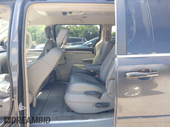 2011 Volkswagen Routan SE with VIN 2V4RW3DGXBR669762, listed as a IAAI auction lot 42693493 with 105,415 mi miles and . Bid and sale history available at DreamBid. Image 8.