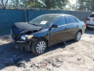 2013 Toyota Corolla L with VIN 5YFBU4EEXDP086518, listed as a IAAI auction lot 41654757 with 151,913 mi miles. Bid and sale history available at carsss.com. Image 2.
