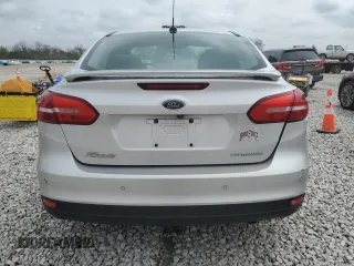2016 Ford Focus Titanium with VIN 1FADP3J22GL354941, listed as a Copart auction lot 54401135 with 144,142 mi miles and Salvage title. Bid and sale history available at DreamBid. Image 6.