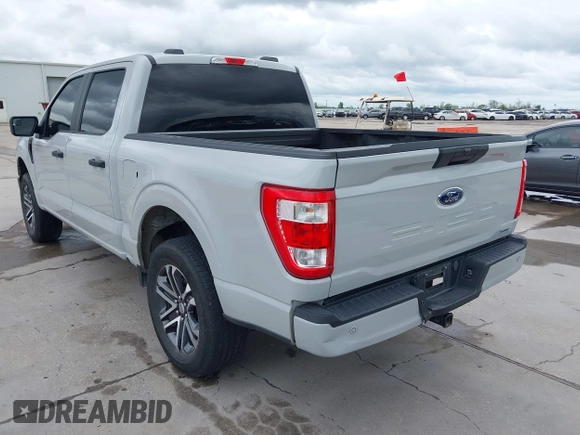 2023 Ford F-150 XL with VIN 1FTEW1EP7PKF17214, listed as a IAAI auction lot 41909017 with 1 mi miles. Bid and sale history available at carsss.com. Image 3.