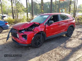 2022 Mitsubishi Eclipse Cross LE z VIN JA4ATVAA2NZ028668, wystawiony jako IAAI lot #42002943 z przebiegiem 77 067 mil mil oraz . Historia ofert i sprzedaży dostępna na DreamBid. Obrazek 2.