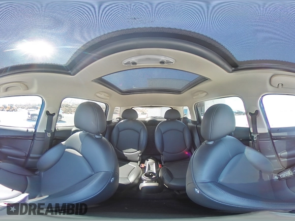 2012 MINI Countryman S with VIN WMWZC5C54CWL57389, listed as a Copart auction lot 49773945 with 120,889 mi miles and Salvage title. Bid and sale history available at DreamBid. Image 12.