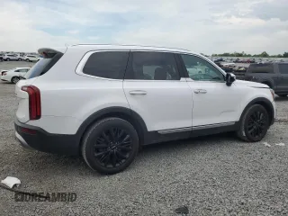 2022 Kia Telluride SX with VIN 5XYP5DHC6NG222534, listed as a Copart auction lot 58656315 with 76,952 mi miles and Salvage title. Bid and sale history available at DreamBid. Image 3.