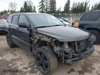 2015 Jeep Grand Cherokee Altitude with VIN 1C4RJFAG4FC135881, listed as a IAAI auction lot 41949306 with 118,467 mi miles. Bid and sale history available at carsss.com. Image 1.
