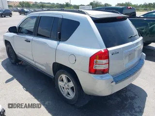 2008 Jeep Compass Sport with VIN 1J8FT47048D767281, listed as a IAAI auction lot 42010343 with 164,734 mi miles. Bid and sale history available at carsss.com. Image 3.