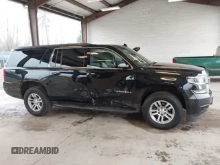 2019 Chevrolet Suburban LT z VIN 1GNSKHKC4KR177374, wystawiony jako IAAI lot #41323234 z przebiegiem 157 470 mil mil oraz . Historia ofert i sprzedaży dostępna na DreamBid. Obrazek 13.