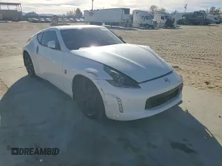 2014 Nissan 370Z Nismo with VIN JN1AZ4EH0EM635111, listed as a Copart auction lot 87292134 with 185,356 mi miles and Salvage Title. Bid and sale history available at DreamBid. Image 11.