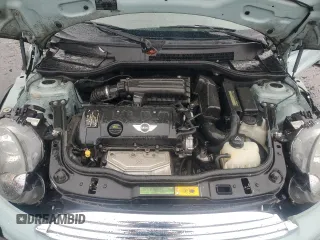 2011 MINI Hardtop with VIN WMWSU3C57BT096973, listed as a Copart auction lot 52726185 with 90,545 mi miles and Salvage title. Bid and sale history available at DreamBid. Image 12.