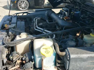 2001 Jeep Wrangler Sport z VIN 1J4FA49S01P329609, wystawiony jako IAAI lot #43091103 z przebiegiem 151 346 mil mil oraz . Historia ofert i sprzedaży dostępna na DreamBid. Obrazek 13.