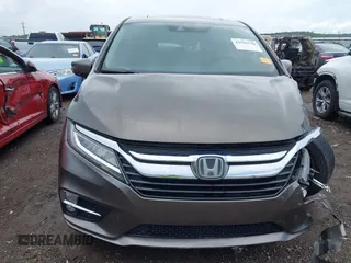 2019 Honda Odyssey Touring with VIN 5FNRL6H81KB038790, listed as a IAAI auction lot 42200190 with 131,761 mi miles and . Bid and sale history available at DreamBid. Image 13.