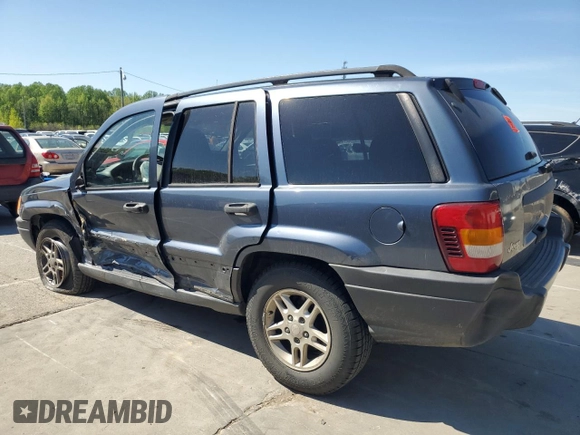 2004 Jeep Grand Cherokee Laredo with VIN 1J4GX48S74C195326, listed as a Copart auction lot 53993785 with 280,456 mi miles and Salvage title. Bid and sale history available at DreamBid. Image 2.