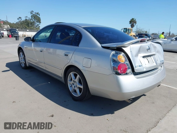 2002 Nissan Altima SE with VIN 1N4BL11E72C169164, listed as a IAAI auction lot 41992002 with 100,211 mi miles. Bid and sale history available at carsss.com. Image 3.