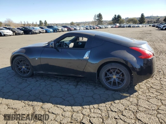2012 Nissan 370Z Touring with VIN JN1AZ4EH4CM561432, listed as a Copart auction lot 89376935 with 128,955 mi miles and Salvage Title. Bid and sale history available at carsss.com. Image 2.