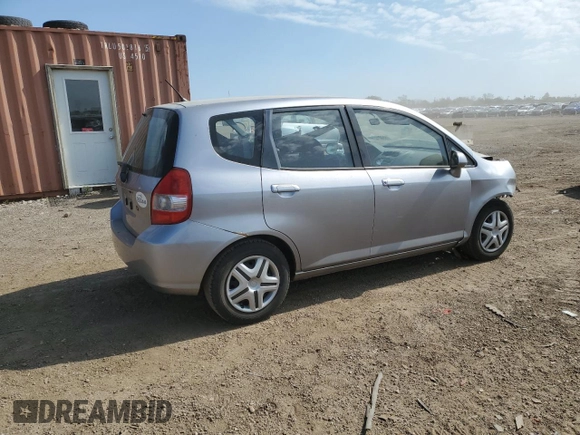 2007 Honda Fit z VIN JHMGD38497S025472, wystawiony jako Copart lot #55901095 z przebiegiem 120 216 mil mil oraz Szkoda całkowita • Salvage title. Historia ofert i sprzedaży dostępna na DreamBid. Obrazek 3.