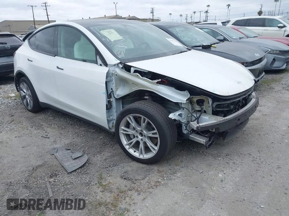 2023 Tesla Model Y Long Range z VIN 7SAYGDEE9PF623285, wystawiony jako IAAI lot #41383184 z przebiegiem 34 092 mil mil oraz . Historia ofert i sprzedaży dostępna na DreamBid. Obrazek 1.